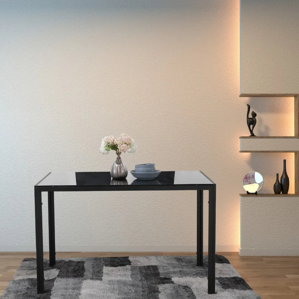 Mesa de comedor negra de vidrio templado